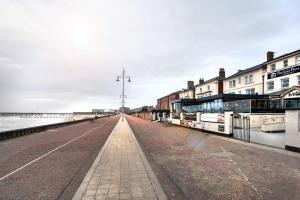 a view of a pier with buildings and the water at Best Western Hotel Hatfield in Lowestoft