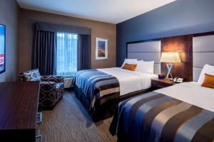 En eller flere senger på et rom på Wingate by Wyndham Kamloops