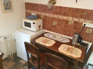 Kuchyň nebo kuchyňský kout v ubytování Apartmán Vrchlice