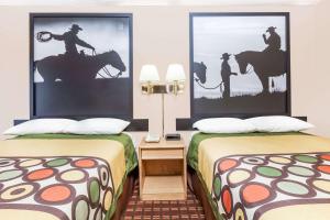 Cama o camas de una habitación en Super 8 by Wyndham Longview/I-20