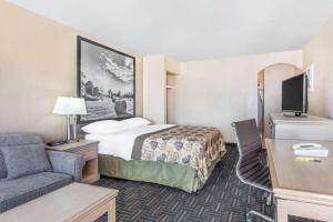 Voodi või voodid majutusasutuse Super 8 by Wyndham Stettler toas