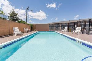The swimming pool at or close to Super 8 by Wyndham Grand Junction Colorado