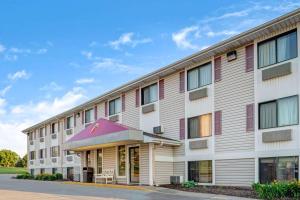 a rendering of the front of a building at Super 8 by Wyndham Omaha I-80 West in Millard