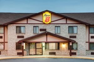 a hotel with a sign on the front of it at Super 8 by Wyndham Kutztown/Allentown Area in Kutztown