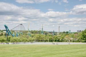 a park with a roller coaster in the background at Super 8 by Wyndham Kutztown/Allentown Area in Kutztown