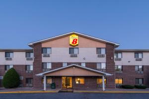 a hotel with a sign on the front of it at Super 8 by Wyndham Front Royal in Front Royal