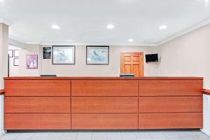 a court room with a large wooden bench at Super 8 by Wyndham Williamsburg/Historic Area in Williamsburg