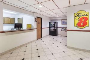 a lobby of a speed eight fast food restaurant at Super 8 by Wyndham Winchester VA in Winchester