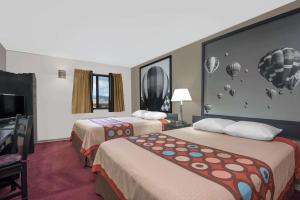 Postel nebo postele na pokoji v ubytování Super 8 by Wyndham Taos + 37 fotografií