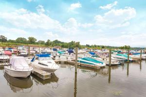 a bunch of boats docked in a harbor at Days Inn by Wyndham Portage in Portage