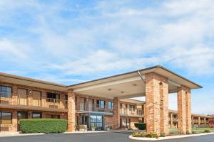 a rendering of a building with a garage at Days Inn by Wyndham New Market I-81 in New Market