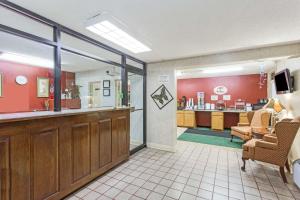 a lobby of a hospital with a waiting room at Super 8 by Wyndham Tifton in Tifton