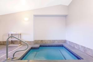 a swimming pool in a building at Super 8 by Wyndham McCall in McCall