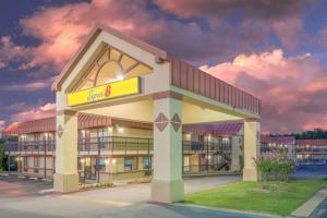 a rendering of a building with a hotel at Super 8 by Wyndham Tulsa in Tulsa