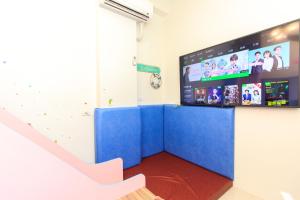 TV a/nebo společenská místnost v ubytování Yilan Dongshan Cypress B&B