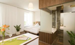 Voodi või voodid majutusasutuse Hotel Constantia toas