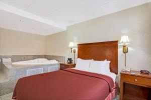 Postel nebo postele na pokoji v ubytování Travelodge by Wyndham Parsippany