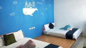 Letto o letti in una camera di Nandian Homestay