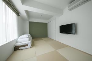 Televisyen dan/atau pusat hiburan di Imu Hotel Kyoto
