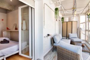 Postel nebo postele na pokoji v ubytování tuGuest Clave de Sol Apartment