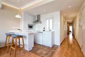 Kuchyň nebo kuchyňský kout v ubytování tuGuest Clave de Sol Apartment