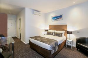 Katil atau katil-katil dalam bilik di Belmercer Motel