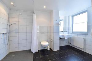Kúpeľňa v ubytovaní Hotel Aspethera