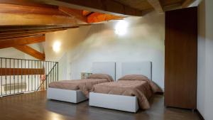 En eller flere senge i et værelse på Residence San Miguel 5