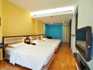 Uma cama ou camas num quarto em Y Loft
