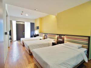 Uma cama ou camas num quarto em Y Loft