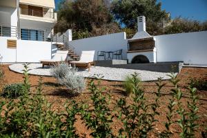 Vonkajšia záhrada v ubytovaní Blue Island Luxury Apartment