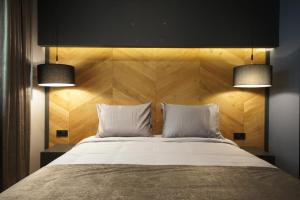 Ліжко або ліжка в номері Hotel London B&B