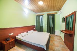 Voodi või voodid majutusasutuse Zedazeni Hotel toas