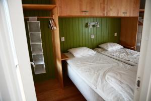 Säng eller sängar i ett rum på Falu Vildvattenpark
