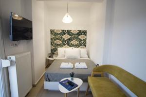 Posteľ alebo postele v izbe v ubytovaní Urban Beach Studio