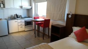 Una cocina o kitchenette en Livin' Residence Rosario