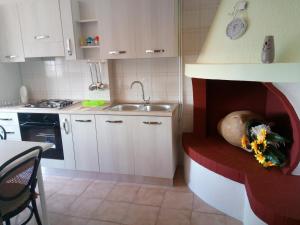 A kitchen or kitchenette at Casa Vacanze Sergio