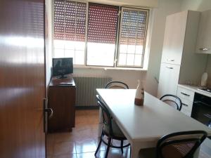 A kitchen or kitchenette at Casa Vacanze Sergio