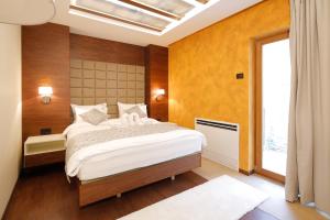 Postel nebo postele na pokoji v ubytování Hotel Passpartù Home Garni