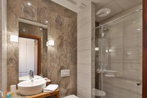 Koupelna v ubytování Hotel Passpartù Home Garni