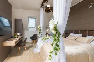 Posteľ alebo postele v izbe v ubytovaní Hotel Panská Zahrada
