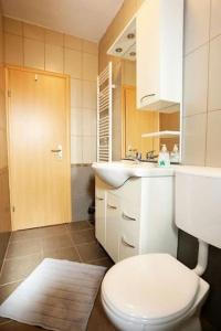 Kúpeľňa v ubytovaní Apartmani Lili