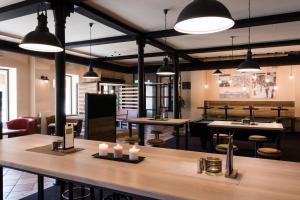 Kuchyň nebo kuchyňský kout v ubytování JUFA Hotel Fürstenfeld