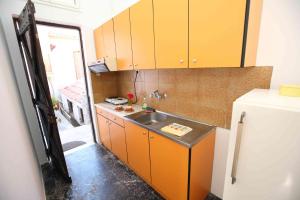 Kuchyňa alebo kuchynka v ubytovaní Mirto Apartments