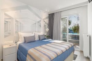 Ένα ή περισσότερα κρεβάτια σε δωμάτιο στο Odysseus Villa +118 φωτογραφίες
