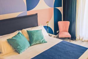 Postel nebo postele na pokoji v ubytování B&B Seataly by W Signature Experiences
