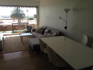 Χώρος καθιστικού στο Appartement Front de Mer avec Piscine