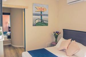 Postel nebo postele na pokoji v ubytování B&B Seataly by W Signature Experiences