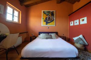 Letto o letti in una camera di Klinec Plešivo Art Rooms