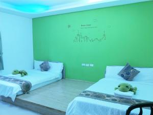 Letto o letti in una camera di Nandian Homestay